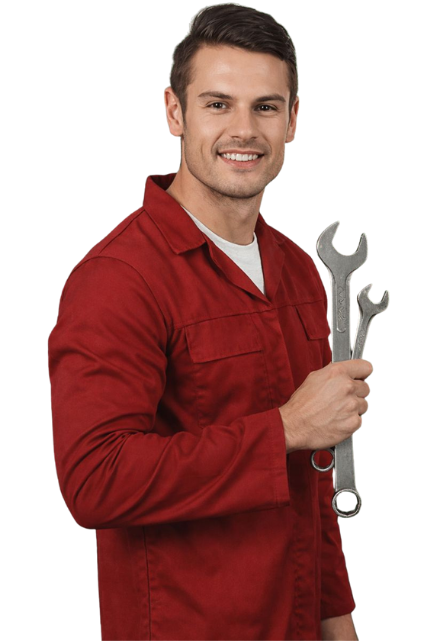 A smiling Expert Auto Glass technician in a red uniform holding wrenches, ready for windshield repair and mobile glass services in Surrey.